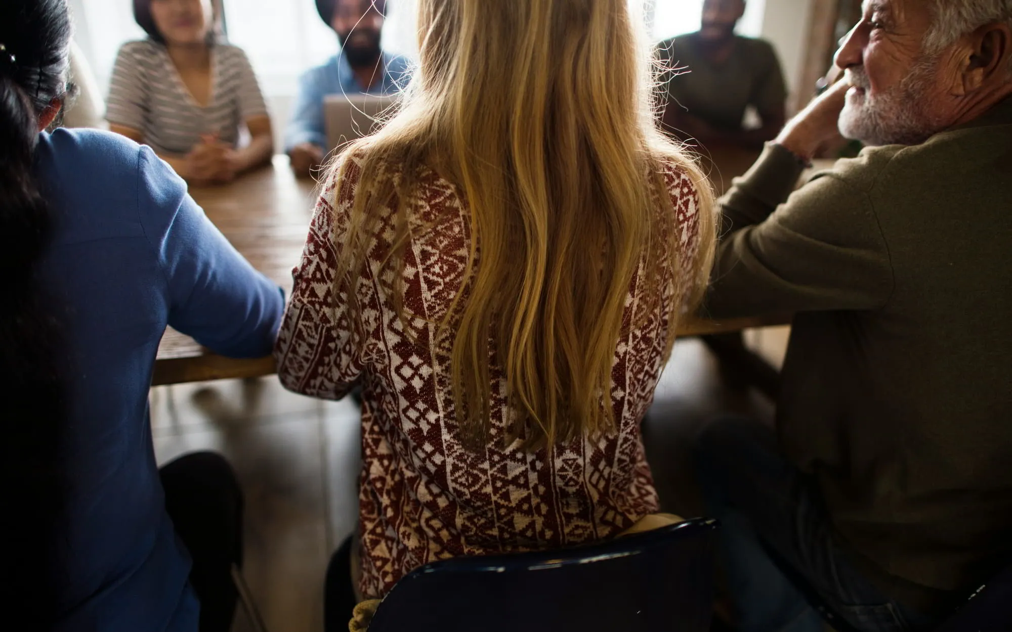 Consumer participants engaged in a market research focus group session